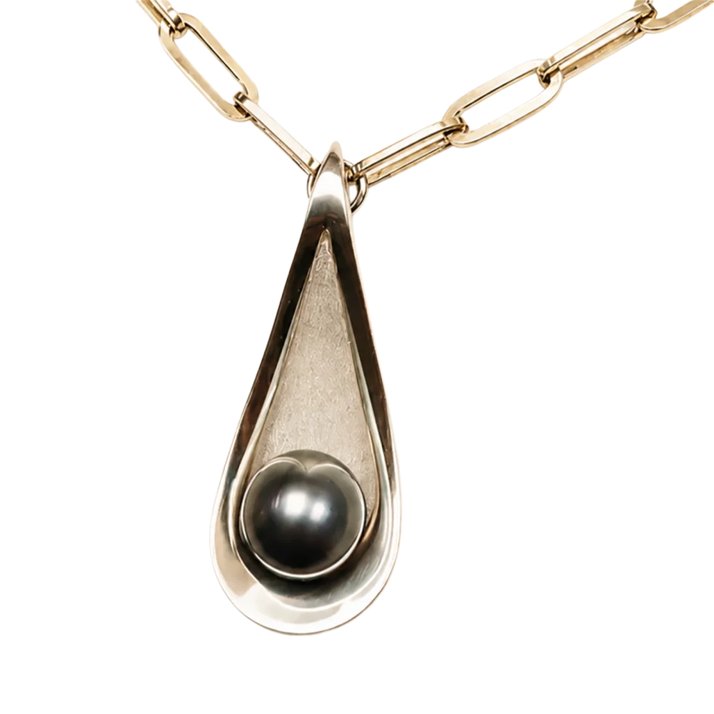 Sterling silver pendant with a Philippine pearl in a teardrop frame