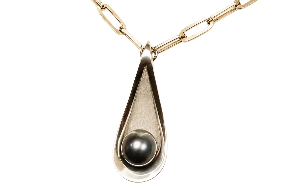Sterling silver pendant with a Philippine pearl in a teardrop frame